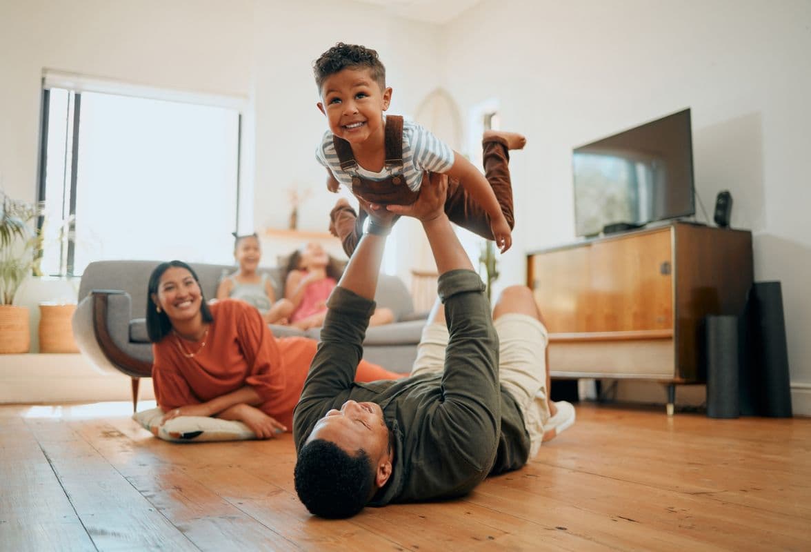 Family_Playing_in_Apartment_Home.jpg